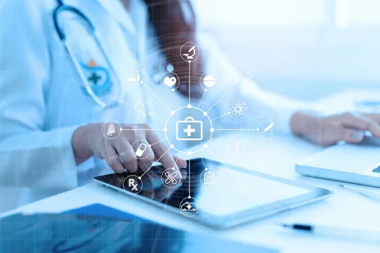 A physician scrolling on a tablet 